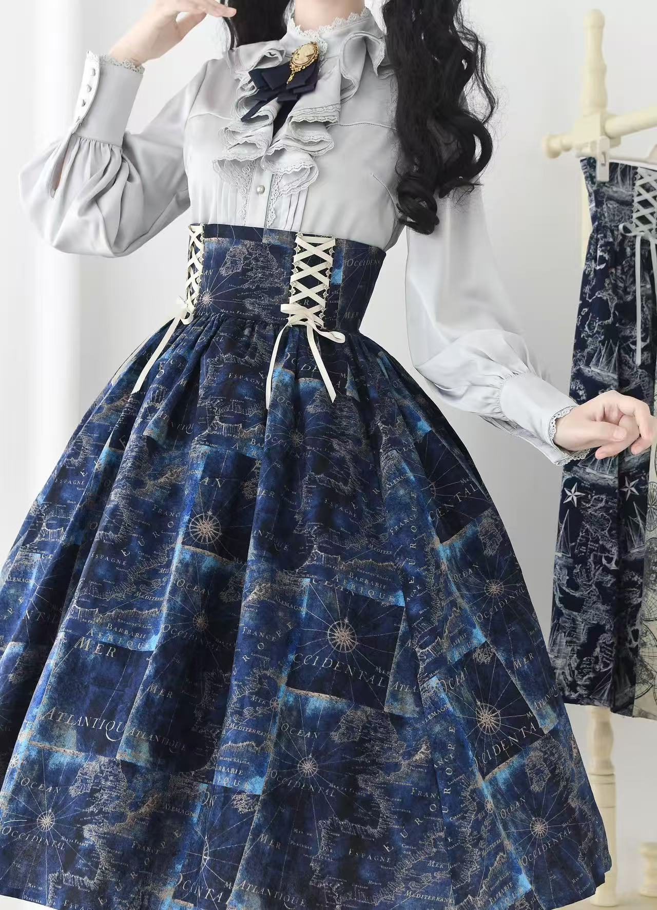 Design Concept:
This Lolita skirt features a vintage navy design with a high-waist puffed silhouette and a captivating starry gradient pattern, inspired by classic English style. The skirt combines elegance with a playful, voluminous shape, making it perfect for daily wear, tea parties, or casual Lolita gatherings. Its soft, breathable fabric ensures comfort while maintaining a structured look, ideal for layering with blouses, jumpers, or outerwear.