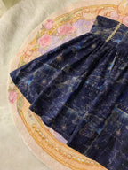 Design Concept:
This Lolita skirt features a vintage navy design with a high-waist puffed silhouette and a captivating starry gradient pattern, inspired by classic English style. The skirt combines elegance with a playful, voluminous shape, making it perfect for daily wear, tea parties, or casual Lolita gatherings. Its soft, breathable fabric ensures comfort while maintaining a structured look, ideal for layering with blouses, jumpers, or outerwear.