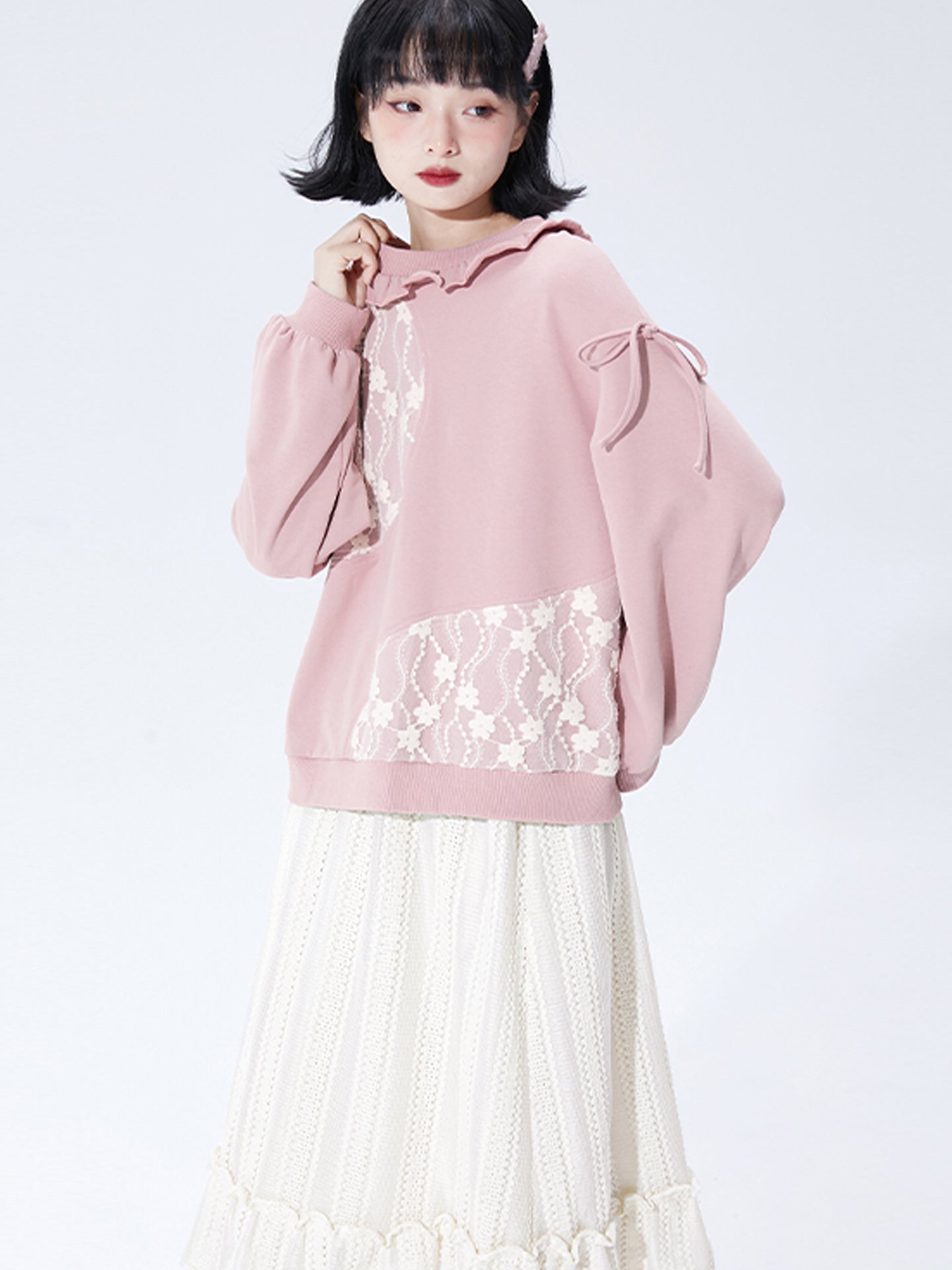 Designed for effortless elegance, this skirt combines a forgiving elastic waistband with a softly flared A-line silhouette to create a universally flattering shape. The subtle flounced hem adds a touch of movement and romance. Crafted in a warm apricot hue, this versatile piece is made to seamlessly transition from casual daytime wear to refined autumn evenings, offering both comfort and timeless style.