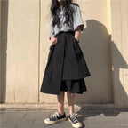 Redefine elegance with this asymmetrical midi skirt designed for curvy figures. The high-waist cut and dramatically flared A-line silhouette create a flattering, flowy shape that elongates the frame. Crafted from lightweight, breathable fabric, it offers comfort for warmer days while the unique hemline adds modern sophistication. Perfect for brunches, garden parties, or elevating everyday style, this skirt combines fashion-forward design with timeless grace. The versatile design transitions seamlessly from 