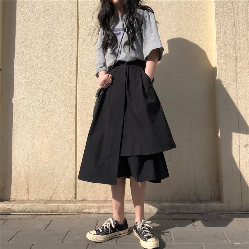 Redefine elegance with this asymmetrical midi skirt designed for curvy figures. The high-waist cut and dramatically flared A-line silhouette create a flattering, flowy shape that elongates the frame. Crafted from lightweight, breathable fabric, it offers comfort for warmer days while the unique hemline adds modern sophistication. Perfect for brunches, garden parties, or elevating everyday style, this skirt combines fashion-forward design with timeless grace. The versatile design transitions seamlessly from 
