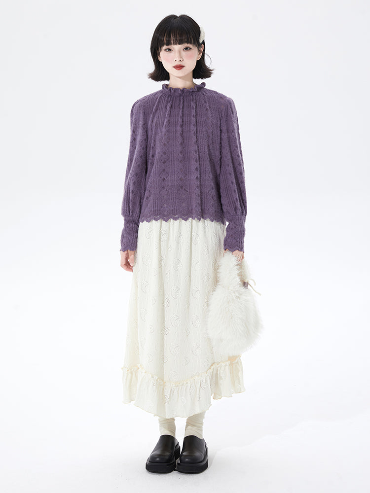 Embrace autumn’s artistry in this beige jacquard knit skirt, where texture meets timeless elegance. Delicate lace-like patterns and a subtle ruffle hem create a soft, romantic silhouette, while the elastic waist ensures effortless comfort. Crafted from premium knit fabric, this A-line midi skirt offers warmth without weight, perfect for transitional weather. Ideal for pairing with cozy sweaters or refined blouses, it blends rustic charm with sophisticated detail. Whether for café dates or evening strolls, t