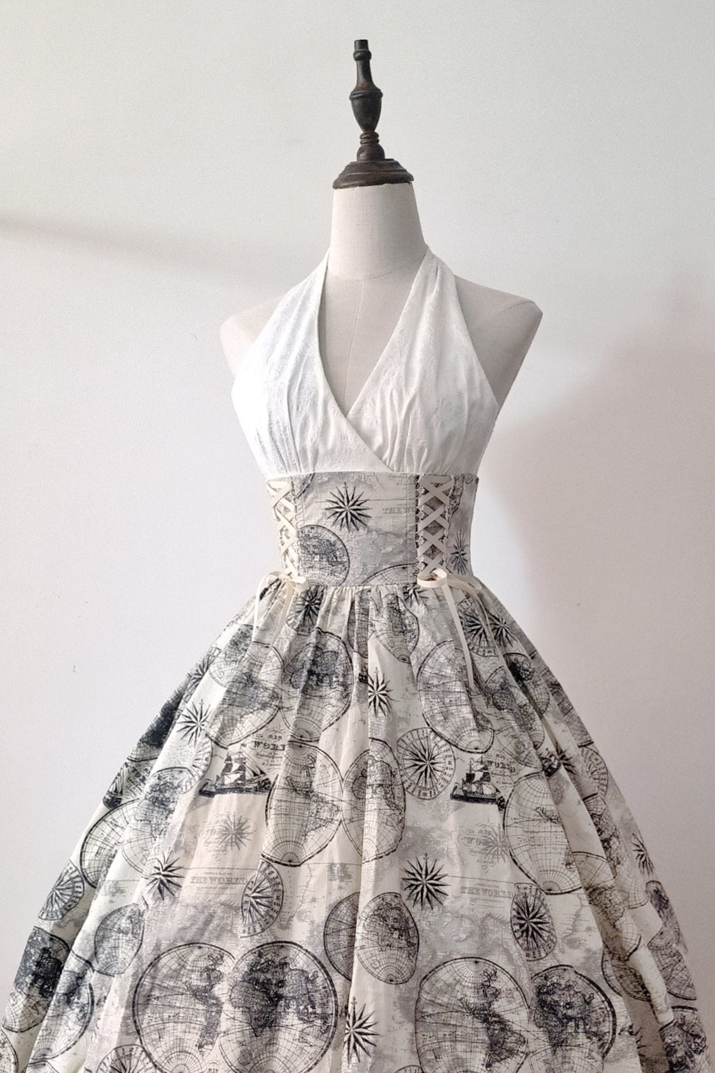 Embark on a journey of timeless elegance with this nautical-inspired Lolita skirt. Crafted in a soft beige hue, the design features intricate vintage sailing ship prints that evoke the romance of oceanic adventures. The high-waist cut and generously flared hem create a dramatic yet graceful silhouette, perfect for twirling. Made from premium lightweight fabric, this skirt balances sophistication with comfort. Ideal for seaside gatherings, themed events, or adding a touch of whimsical nostalgia to your coord