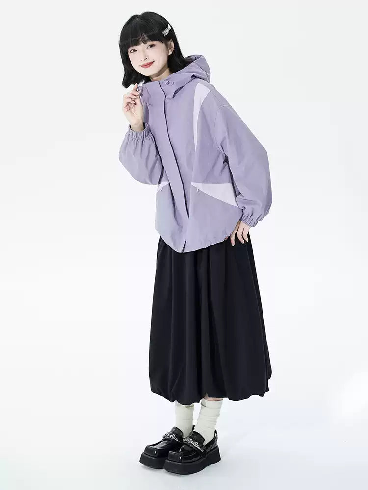 Bloom into summer elegance with this black ruffled midi skirt, designed to flatter petite frames. The elastic waist offers comfort and ease, while the gentle A-line silhouette and layered "bloom" hem create a romantic, flowing shape. Crafted from lightweight fabric for breathable warmth, this piece blends vintage charm with modern versatility. Perfect for garden parties, café dates, or elevating everyday style, it pairs effortlessly with blouses or casual tees. Embrace a touch of poetic drama and timeless g