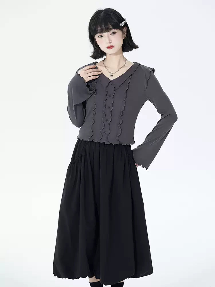 Bloom into summer elegance with this black ruffled midi skirt, designed to flatter petite frames. The elastic waist offers comfort and ease, while the gentle A-line silhouette and layered "bloom" hem create a romantic, flowing shape. Crafted from lightweight fabric for breathable warmth, this piece blends vintage charm with modern versatility. Perfect for garden parties, café dates, or elevating everyday style, it pairs effortlessly with blouses or casual tees. Embrace a touch of poetic drama and timeless g