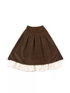 This skirt blends vintage charm with modern elegance. The high-waisted A-line silhouette and delicate pleats gracefully conceal hips and elongate the figure. A soft flounce hem adds a touch of romantic movement. Crafted from warm wool blend fabric, it's designed for both comfort and style, offering a timeless piece that transitions seamlessly from casual daytime outings to refined autumn evenings.