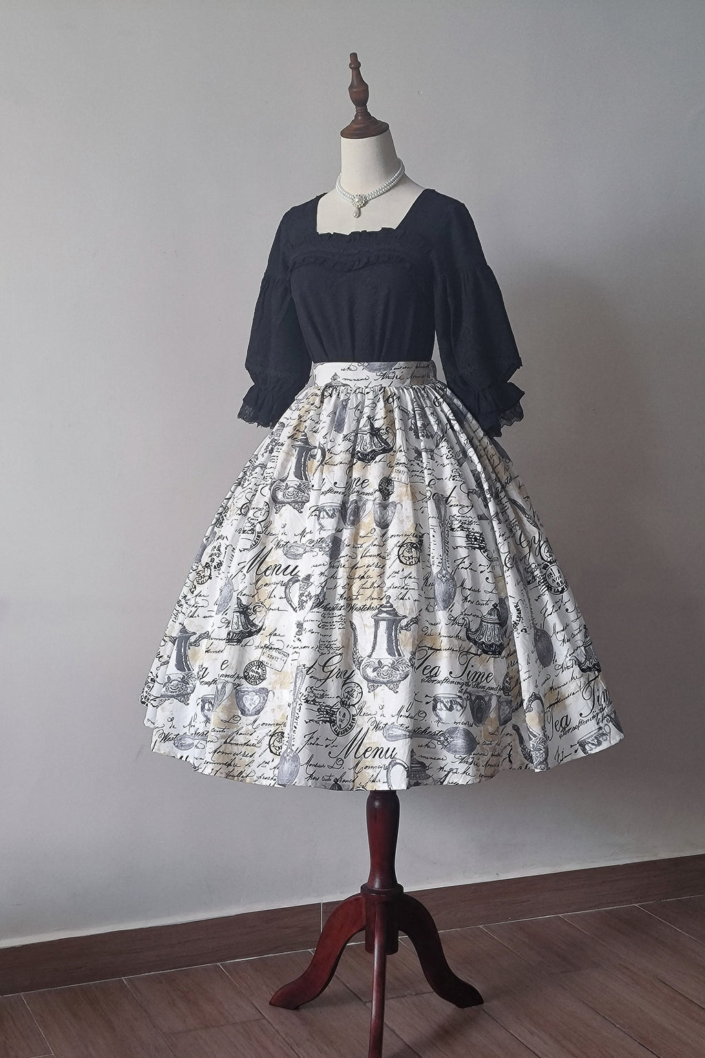 Savor the charm of a timeless afternoon tea party with this custom Lolita skirt. Featuring an exclusive vintage-inspired print and a flattering high-waist A-line cut, this piece blends elegance with whimsical nostalgia. Crafted from premium fabric, the skirt maintains its structured silhouette while offering comfort for all-day wear. The original design showcases delicate motifs that evoke the romance of classic porcelain patterns, making it a perfect choice for garden gatherings, tea parties, or enchanting