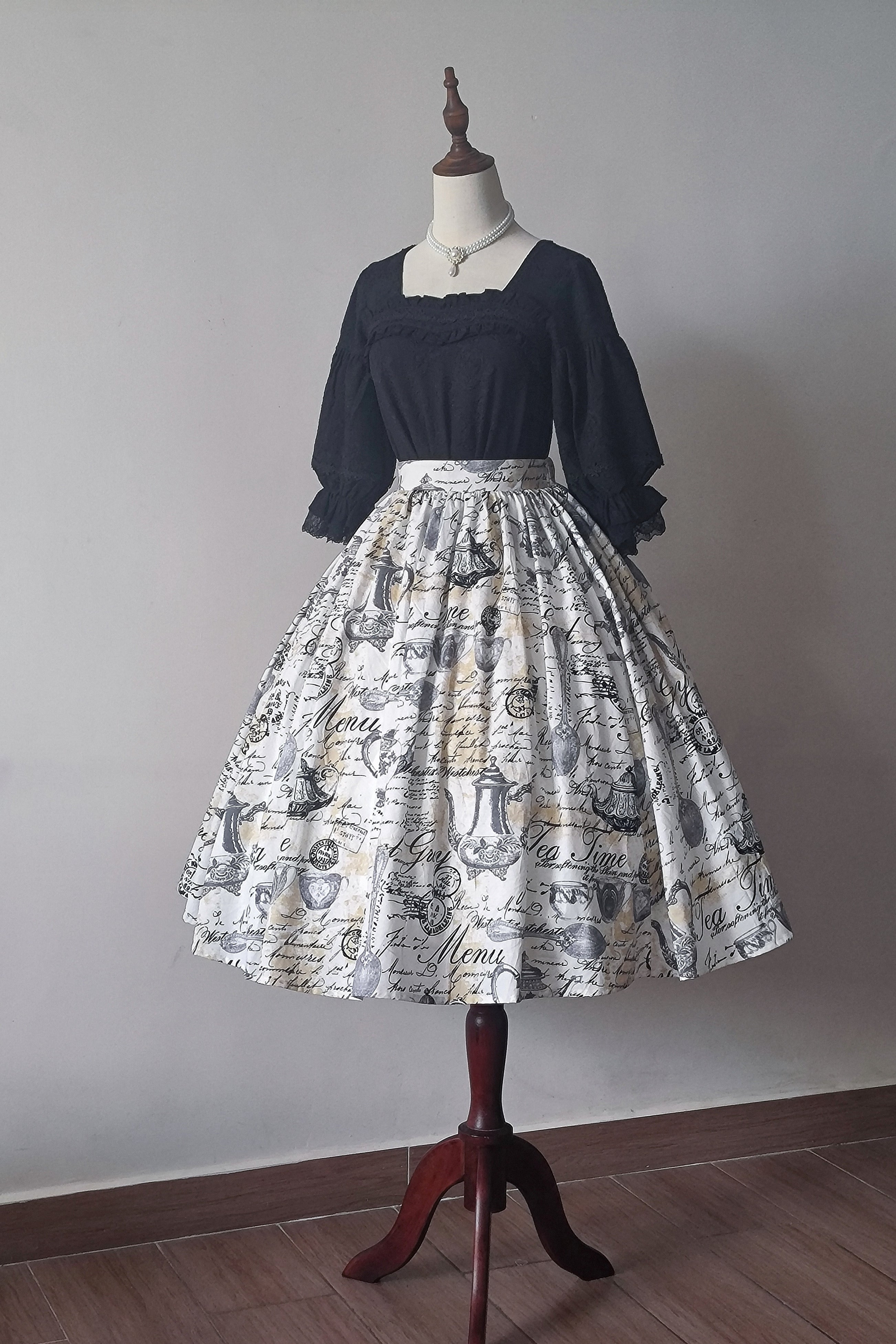 Savor the charm of a timeless afternoon tea party with this custom Lolita skirt. Featuring an exclusive vintage-inspired print and a flattering high-waist A-line cut, this piece blends elegance with whimsical nostalgia. Crafted from premium fabric, the skirt maintains its structured silhouette while offering comfort for all-day wear. The original design showcases delicate motifs that evoke the romance of classic porcelain patterns, making it a perfect choice for garden gatherings, tea parties, or enchanting