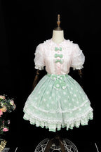 This sweet Lolita skirt combines vibrant red, green and orange hues in a playful summer design. The elastic waist ensures comfortable flexibility while layered chiffon and mesh create dynamic texture. Delicate bow accents add classic Lolita charm to this short skirt silhouette. Perfect for creating sweet or classic coordinates, this lightweight skirt offers effortless movement and timeless elegance. The cheerful color palette makes it ideal for seasonal celebrations and everyday fantasy wear.