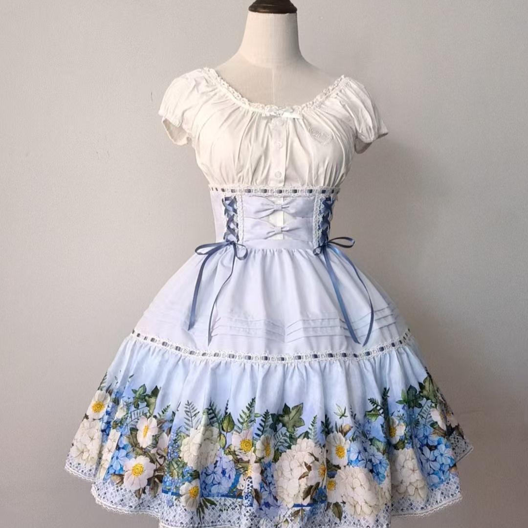 Bloom into elegance with this floral Lolita skirt, where vintage-inspired blossoms dance across a graceful A-line silhouette. The high-waist design accentuates your figure while the layered construction creates a light, airy volume perfect for spring gatherings. Delicate碎花印花 evokes the romance of a secret garden, crafted from premium fabric for both structure and comfort. Ideal for tea parties, garden events, or adding a touch of whimsy to everyday wear, this skirt celebrates the timeless beauty of nature t