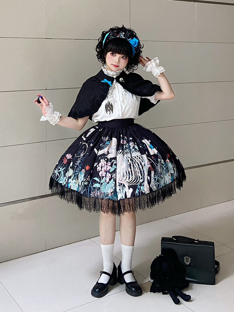 Unveil a realm of dark elegance with this original Gothic Lolita set, featuring an intricately embossed pattern that whispers of ancient mysteries. The high-waist SK skirt flows into a dramatic silhouette, paired with a matching cape that adds layers of theatrical grandeur. Crafted from premium textured fabric, the ensemble balances sophistication with subversive charm. Ideal for moonlit gatherings, Gothic events, or making a bold fashion statement, this set celebrates the artistry of shadow and light—where