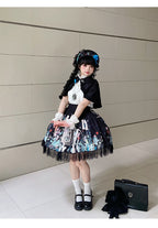 Unveil a realm of dark elegance with this original Gothic Lolita set, featuring an intricately embossed pattern that whispers of ancient mysteries. The high-waist SK skirt flows into a dramatic silhouette, paired with a matching cape that adds layers of theatrical grandeur. Crafted from premium textured fabric, the ensemble balances sophistication with subversive charm. Ideal for moonlit gatherings, Gothic events, or making a bold fashion statement, this set celebrates the artistry of shadow and light—where