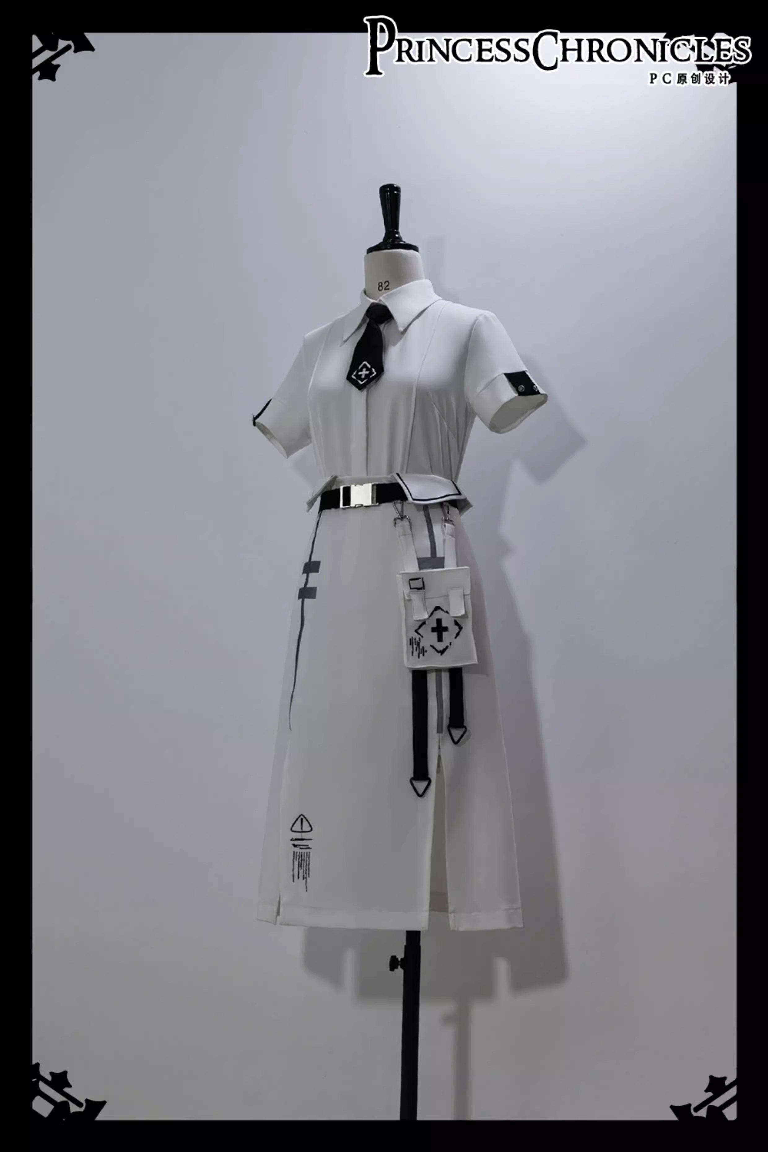 Blending Lolita’s delicate silhouette with techwear’s utilitarian edge, this skirt features asymmetric layered tiers, modular attachment points, and hidden pockets. The crisp white fabric contrasts with tactical straps and geometric seams, creating a fusion of poetic softness and cyberpunk functionality. Designed for dynamic movement and layered styling, it embodies a future where elegance meets rebellion.