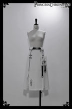 Blending Lolita’s delicate silhouette with techwear’s utilitarian edge, this skirt features asymmetric layered tiers, modular attachment points, and hidden pockets. The crisp white fabric contrasts with tactical straps and geometric seams, creating a fusion of poetic softness and cyberpunk functionality. Designed for dynamic movement and layered styling, it embodies a future where elegance meets rebellion.