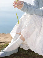 The Lazy Days Cake Skirt is designed to embody effortless elegance and comfort. Its namesake A-line silhouette, flaring gently from the hips, recalls the soft, delightful layers of a cake. Crafted from a premium, flowy fabric, it offers beautiful movement. The elevated midi length and versatile design are intentionally created to flatter the petite frame, providing a timeless piece that seamlessly transitions from a casual day out to a more polished autumn ensemble.