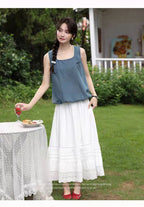 The Lazy Days Cake Skirt is designed to embody effortless elegance and comfort. Its namesake A-line silhouette, flaring gently from the hips, recalls the soft, delightful layers of a cake. Crafted from a premium, flowy fabric, it offers beautiful movement. The elevated midi length and versatile design are intentionally created to flatter the petite frame, providing a timeless piece that seamlessly transitions from a casual day out to a more polished autumn ensemble.