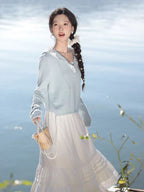 The Lazy Days Cake Skirt is designed to embody effortless elegance and comfort. Its namesake A-line silhouette, flaring gently from the hips, recalls the soft, delightful layers of a cake. Crafted from a premium, flowy fabric, it offers beautiful movement. The elevated midi length and versatile design are intentionally created to flatter the petite frame, providing a timeless piece that seamlessly transitions from a casual day out to a more polished autumn ensemble.