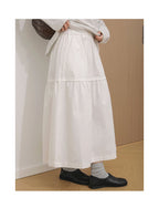 The Muse Society A-line skirt combines minimalist elegance with thoughtful design. The high-waisted cut and strategic pleating work to flatter your silhouette, effortlessly smoothing the waist and hips for a slimming effect. Crafted from a soft, breathable cotton-blend fabric, it ensures all-day comfort. This versatile skirt is designed to be a timeless, ageless staple in your wardrobe, perfect for creating a chic and polished look that transitions seamlessly across seasons.