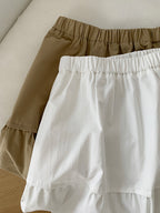 The Muse Society A-line skirt combines minimalist elegance with thoughtful design. The high-waisted cut and strategic pleating work to flatter your silhouette, effortlessly smoothing the waist and hips for a slimming effect. Crafted from a soft, breathable cotton-blend fabric, it ensures all-day comfort. This versatile skirt is designed to be a timeless, ageless staple in your wardrobe, perfect for creating a chic and polished look that transitions seamlessly across seasons.