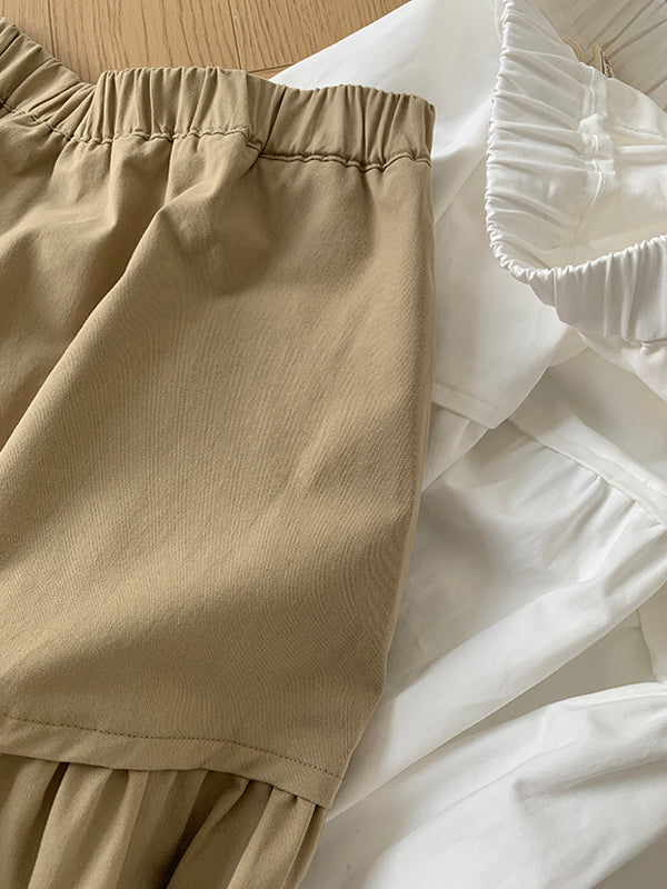 The Muse Society A-line skirt combines minimalist elegance with thoughtful design. The high-waisted cut and strategic pleating work to flatter your silhouette, effortlessly smoothing the waist and hips for a slimming effect. Crafted from a soft, breathable cotton-blend fabric, it ensures all-day comfort. This versatile skirt is designed to be a timeless, ageless staple in your wardrobe, perfect for creating a chic and polished look that transitions seamlessly across seasons.