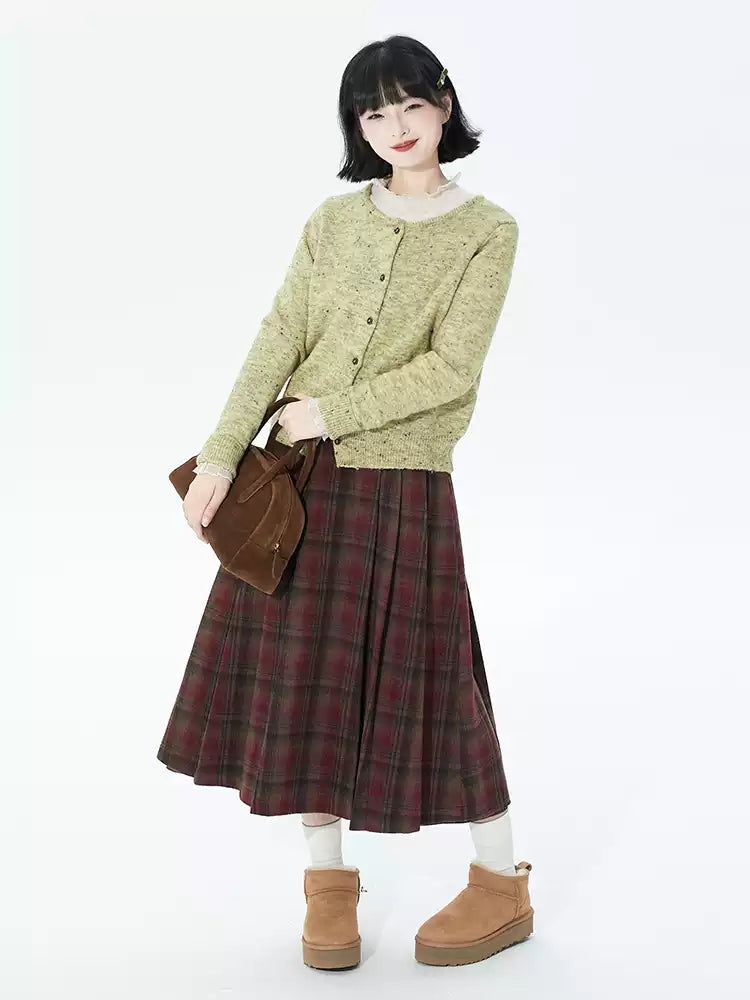 Embrace autumn’s warmth with this vintage-inspired red tartan skirt, crafted from soft wool blend fabric for cozy comfort. The classic A-line silhouette and gentle pleats create a flattering, relaxed fit, while the midi length adds timeless elegance. Perfect for pairing with sweaters or blouses, this skirt blends rustic charm with refined versatility. Ideal for crisp fall days, holiday gatherings, or adding a touch of nostalgic romance to your wardrobe. Designed for both style and substance, it invites you 