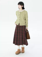 Embrace autumn’s warmth with this vintage-inspired red tartan skirt, crafted from soft wool blend fabric for cozy comfort. The classic A-line silhouette and gentle pleats create a flattering, relaxed fit, while the midi length adds timeless elegance. Perfect for pairing with sweaters or blouses, this skirt blends rustic charm with refined versatility. Ideal for crisp fall days, holiday gatherings, or adding a touch of nostalgic romance to your wardrobe. Designed for both style and substance, it invites you 