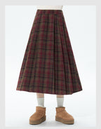 Embrace autumn’s warmth with this vintage-inspired red tartan skirt, crafted from soft wool blend fabric for cozy comfort. The classic A-line silhouette and gentle pleats create a flattering, relaxed fit, while the midi length adds timeless elegance. Perfect for pairing with sweaters or blouses, this skirt blends rustic charm with refined versatility. Ideal for crisp fall days, holiday gatherings, or adding a touch of nostalgic romance to your wardrobe. Designed for both style and substance, it invites you 