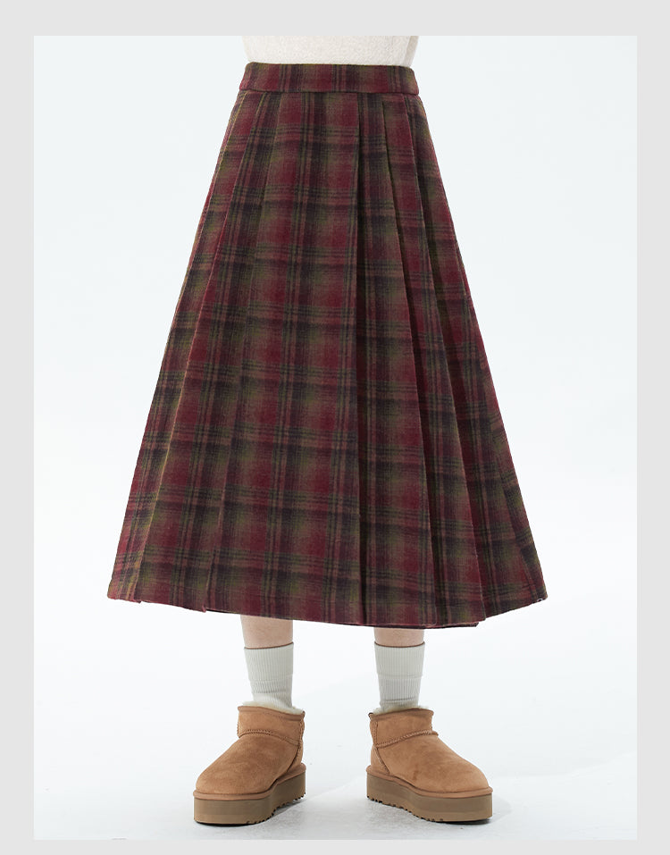 Embrace autumn’s warmth with this vintage-inspired red tartan skirt, crafted from soft wool blend fabric for cozy comfort. The classic A-line silhouette and gentle pleats create a flattering, relaxed fit, while the midi length adds timeless elegance. Perfect for pairing with sweaters or blouses, this skirt blends rustic charm with refined versatility. Ideal for crisp fall days, holiday gatherings, or adding a touch of nostalgic romance to your wardrobe. Designed for both style and substance, it invites you 