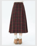 Embrace autumn’s warmth with this vintage-inspired red tartan skirt, crafted from soft wool blend fabric for cozy comfort. The classic A-line silhouette and gentle pleats create a flattering, relaxed fit, while the midi length adds timeless elegance. Perfect for pairing with sweaters or blouses, this skirt blends rustic charm with refined versatility. Ideal for crisp fall days, holiday gatherings, or adding a touch of nostalgic romance to your wardrobe. Designed for both style and substance, it invites you 