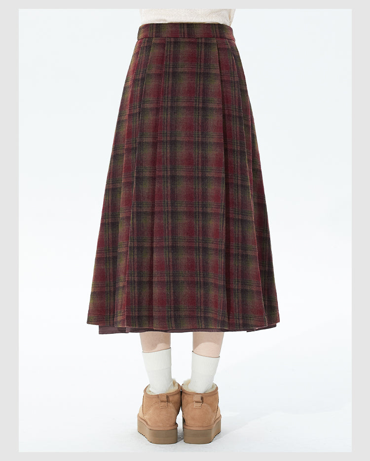Embrace autumn’s warmth with this vintage-inspired red tartan skirt, crafted from soft wool blend fabric for cozy comfort. The classic A-line silhouette and gentle pleats create a flattering, relaxed fit, while the midi length adds timeless elegance. Perfect for pairing with sweaters or blouses, this skirt blends rustic charm with refined versatility. Ideal for crisp fall days, holiday gatherings, or adding a touch of nostalgic romance to your wardrobe. Designed for both style and substance, it invites you 