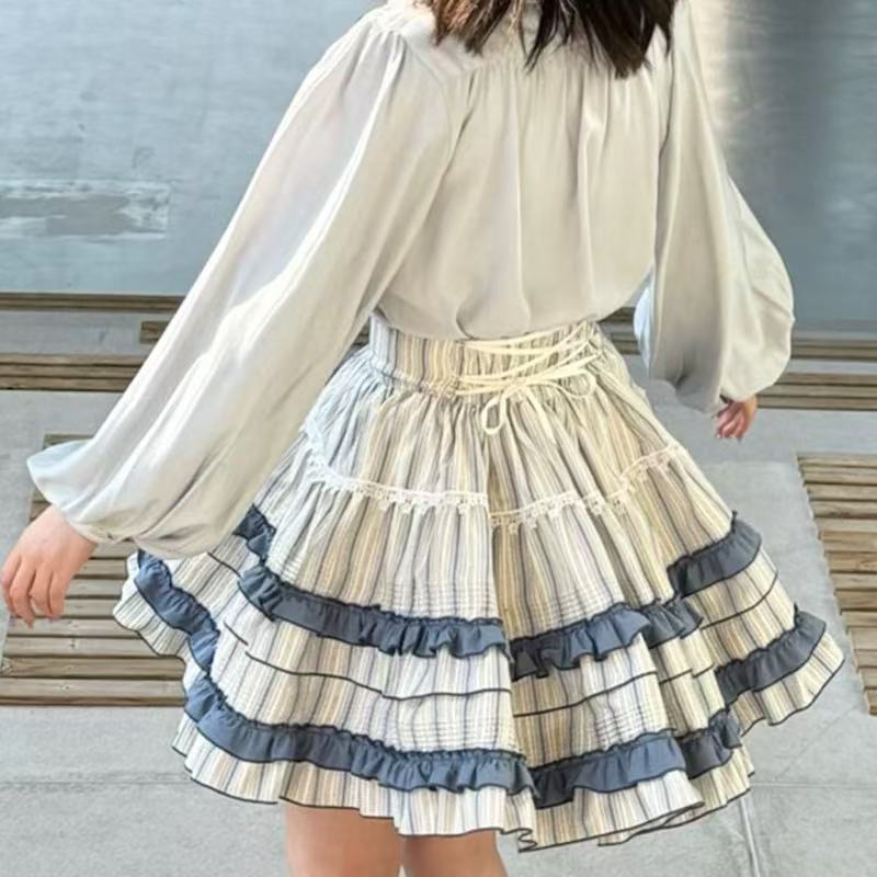 Design Concept:
This Lolita skirt features a charming white and blue patchwork design crafted from soft cotton. With its wide hem and voluminous silhouette, the skirt embodies a playful yet elegant Lolita style. The crisp color contrast adds freshness and vibrancy, making it perfect for daily wear, tea parties, or casual outings.