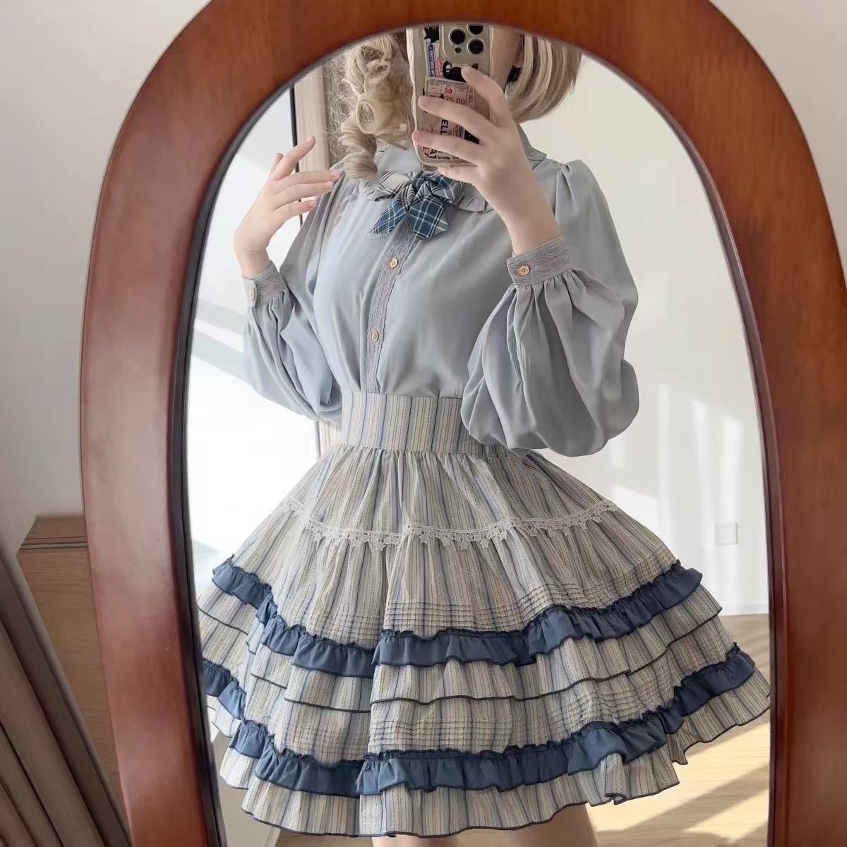 Design Concept:
This Lolita skirt features a charming white and blue patchwork design crafted from soft cotton. With its wide hem and voluminous silhouette, the skirt embodies a playful yet elegant Lolita style. The crisp color contrast adds freshness and vibrancy, making it perfect for daily wear, tea parties, or casual outings.
