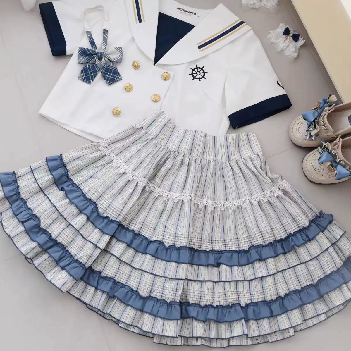 Design Concept:
This Lolita skirt features a charming white and blue patchwork design crafted from soft cotton. With its wide hem and voluminous silhouette, the skirt embodies a playful yet elegant Lolita style. The crisp color contrast adds freshness and vibrancy, making it perfect for daily wear, tea parties, or casual outings.