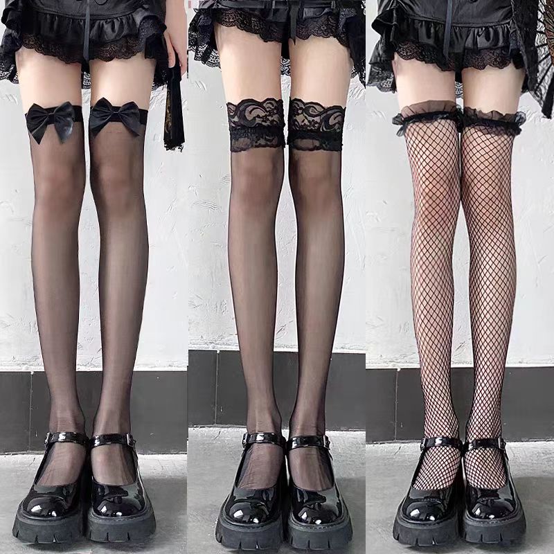 Designed for the daring and elegant, these black Gothic socks blend seduction with sophistication. The over-the-knee length and wide cuff create a striking silhouette, while intricate lace and fishnet detailing add texture and allure. Perfect for completing a bold Lolita or Gothic coord, these socks empower wearers to embrace their darkly romantic side. Crafted for both style and statement, they transform any outfit into a masterpiece of dramatic elegance.