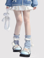 Inspired by the cozy kawaii aesthetics of Japanese street fashion, these knit leg warmers blend playful charm with winter comfort. The delicate lace trim, fluffy pompom details, and soft cream-pink color palette evoke a sweet Lolita vibe. Perfect for layering in fall and winter, they add a touch of dreamy elegance to any outfit while keeping you warm and stylish.