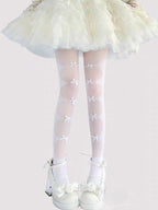 Inspired by the delicate charm of Lolita fashion, these cream-colored tights blend elegance with practicality. Featuring a subtle bow detail and ultra-sheer lightweight fabric, they offer a perfect summer layering piece. The snag-resistant construction ensures durability, while the soft cream hue adds a touch of romantic innocence to any Lolita coordinate. Designed for both beauty and everyday wear.