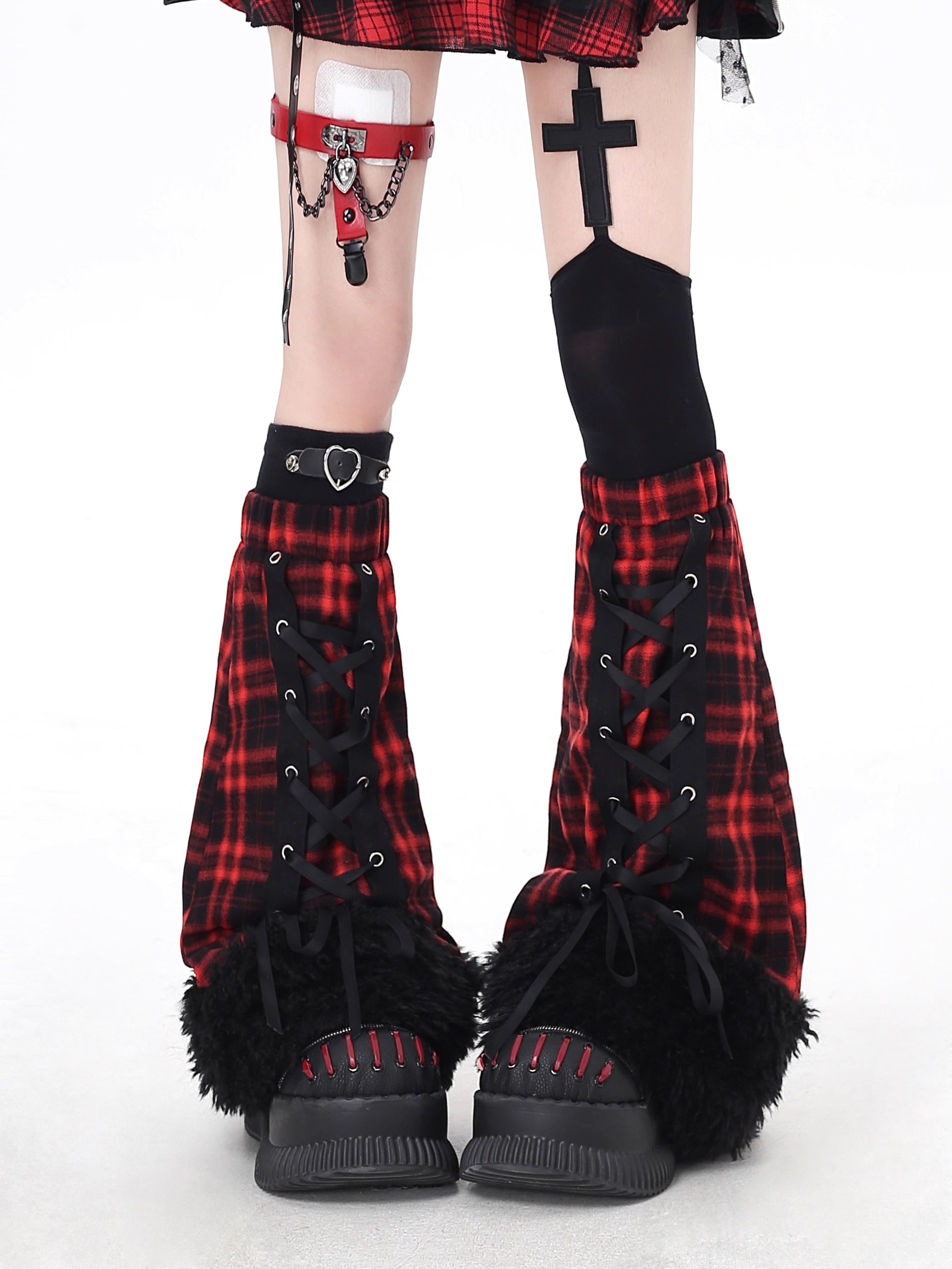 Mixing Victorian dark romance with cozy texture, these leg warmers feature lace-up details, soft plaid patterning, and a fuzzy knit finish. The rich red hue adds dramatic warmth, perfect for layering over boots or bare legs. Edgy, luxurious, and ideal for alt-fashion enthusiasts.