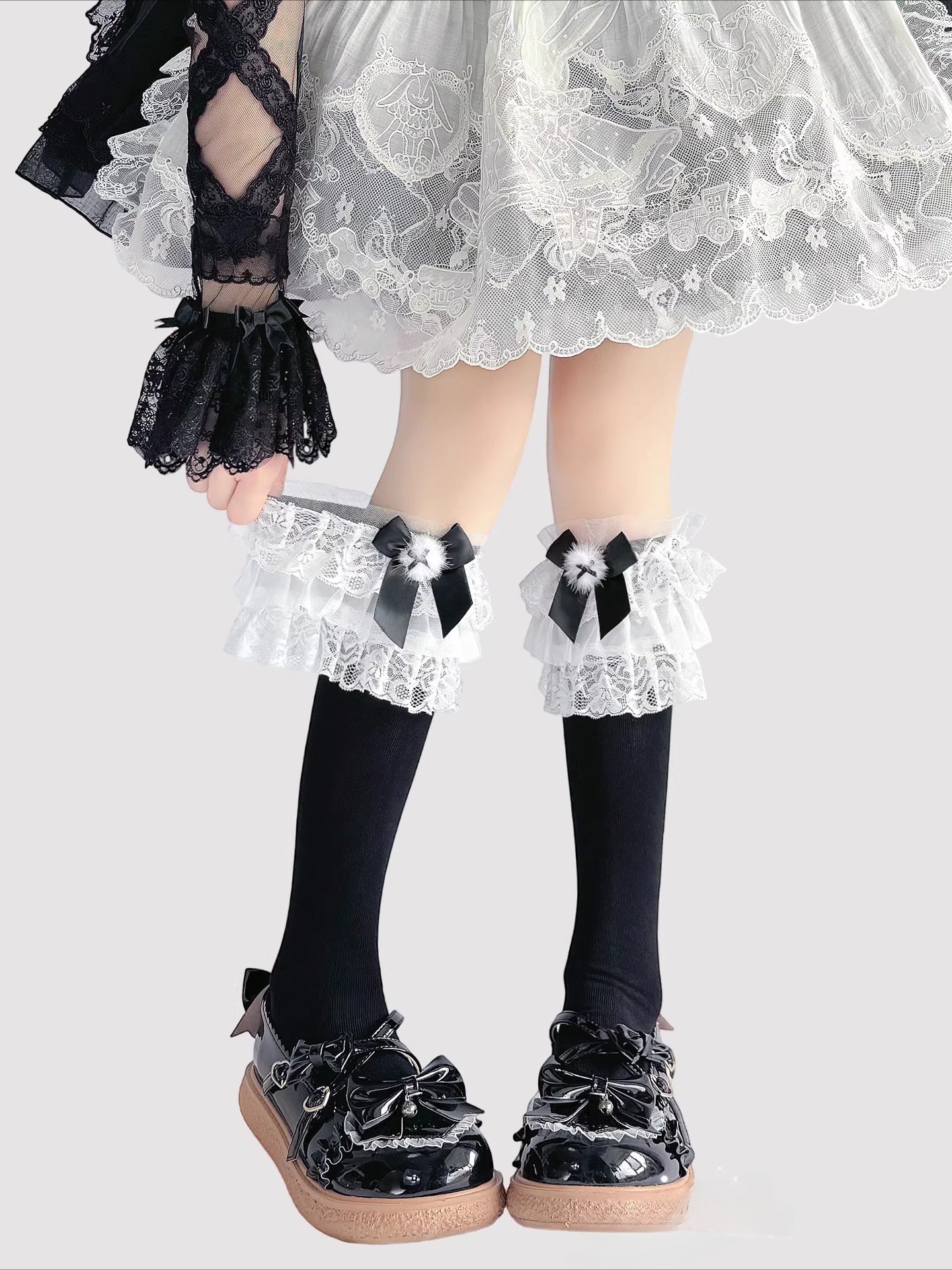 Step into a world of sweet elegance with these multi-color Lolita knee-high socks. Crafted from soft, breathable cotton, each pair features delicate lace trim along the top and charming bow accents, adding a playful yet refined touch to your outfit. Perfect for pairing with Lolita dresses, skirts, or school-style JK ensembles, these socks bring a cute and whimsical element to daily wear, tea parties, or special gatherings. Comfortable and versatile, they are an essential accessory for any Lolita fashion ent