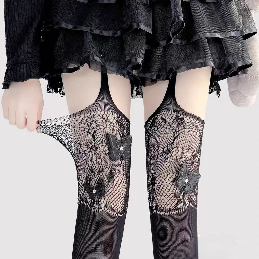 Designed for the bold and glamorous, these fishnet tights redefine edgy elegance. Delicate butterfly motifs adorned with sparkling rhinestones create a striking contrast against the sheer net fabric. The intricate strappy design and lace detailing add a touch of provocative sophistication, perfect for making a statement night out or elevating any daring fashion ensemble. Confidence woven into every thread.