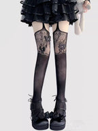 Designed for the bold and glamorous, these fishnet tights redefine edgy elegance. Delicate butterfly motifs adorned with sparkling rhinestones create a striking contrast against the sheer net fabric. The intricate strappy design and lace detailing add a touch of provocative sophistication, perfect for making a statement night out or elevating any daring fashion ensemble. Confidence woven into every thread.