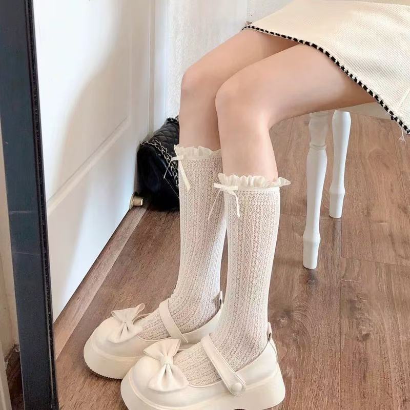 Design Concept:
These Lolita mid-calf socks in black and ivory combine playful elegance with charming detailing. Crafted from soft, breathable fabric, they feature delicate lace trim and adorable bow accents, adding a sweet, feminine touch to any Lolita ensemble. Perfect for daily wear, tea parties, or completing a layered Lolita look, these socks bring both comfort and style to your outfit.