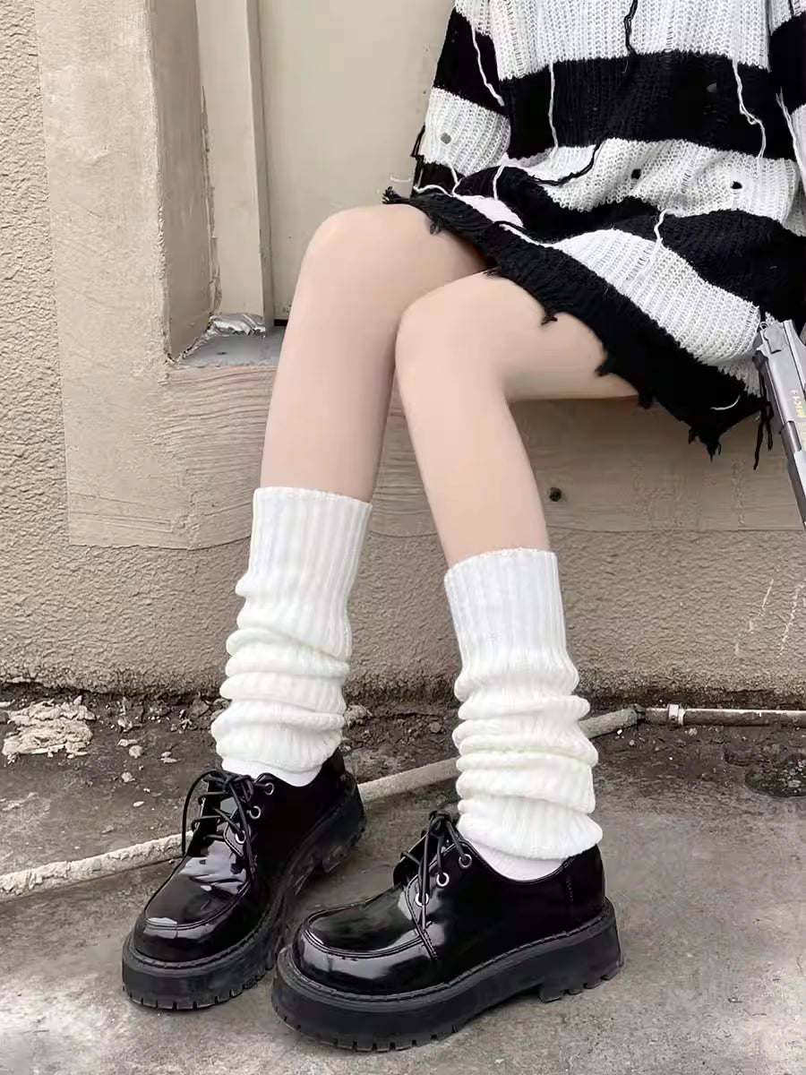 Design Concept:


Step into playful Y2K-inspired Lolita style with these long tube knit leg warmers. Available in white, black, pink, and gray, they feature a soft, stretchy knit that hugs the legs comfortably while adding a layered, “stacked” look perfect for pairing with skirts or dresses. Delicate lace trims and cute bow accents enhance their sweet and whimsical aesthetic, making them ideal for daily wear, tea parties, or casual Lolita gatherings. The versatile colors allow effortless coordination with a