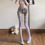 Inspired by Japanese Lolita fashion, these thigh high socks combine playful elegance with delicate charm. Featuring intricate lace trim and a cute bow ribbon tie detail, they create a sweet yet sophisticated statement piece. Designed to elevate any outfit with kawaii elegance, these socks capture the romantic essence of Harajuku street style while offering comfortable wear for daily fashion expression.