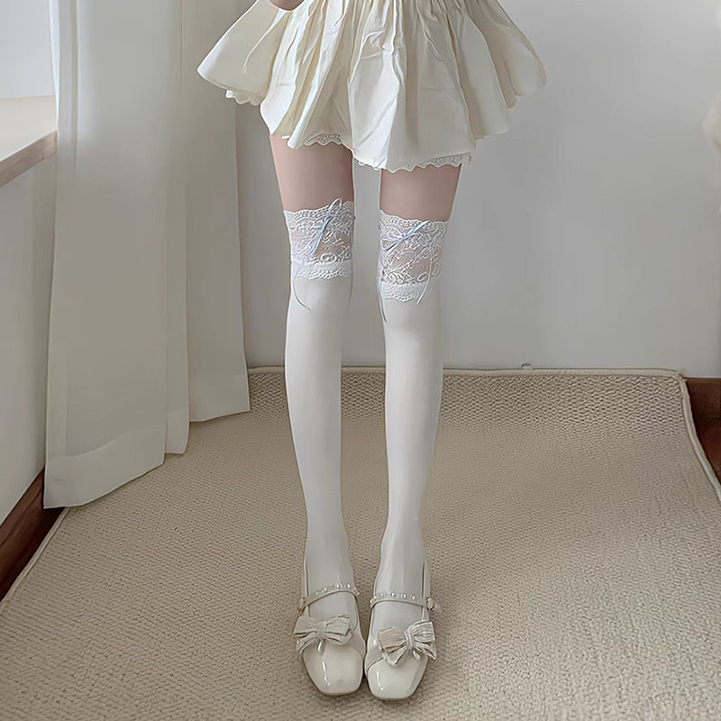 Inspired by Japanese Lolita fashion, these thigh high socks combine playful elegance with delicate charm. Featuring intricate lace trim and a cute bow ribbon tie detail, they create a sweet yet sophisticated statement piece. Designed to elevate any outfit with kawaii elegance, these socks capture the romantic essence of Harajuku street style while offering comfortable wear for daily fashion expression.