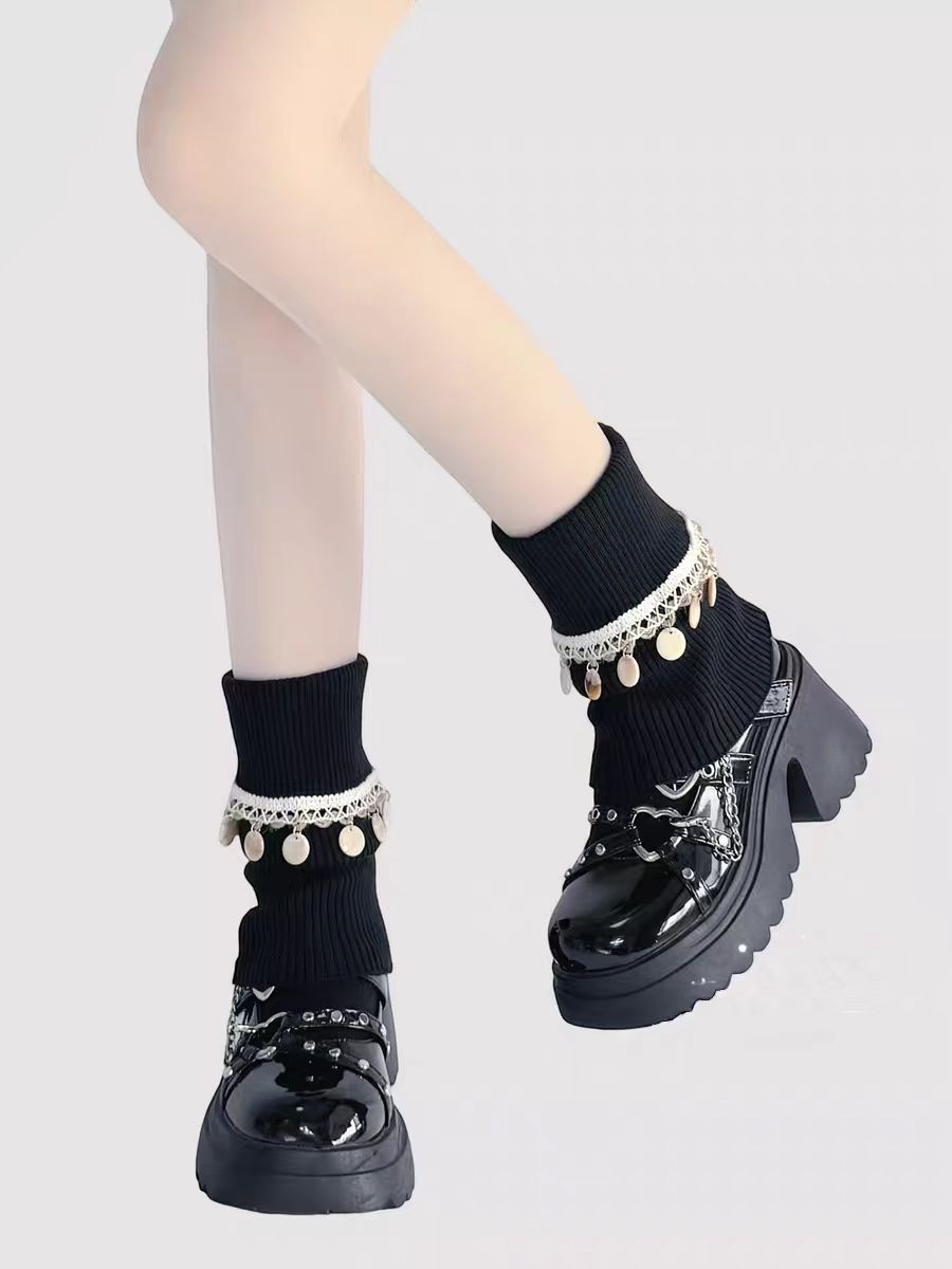Inspired by Japanese school fashion and winter coziness, these knit leg warmers combine playful charm with warmth. The soft cream color, fluffy pom-pom detail, and fold-over fringe design create a sweet, nostalgic aesthetic. Perfect for pairing with JK uniforms or casual outfits, they offer both style and comfort during the chilly seasons.
