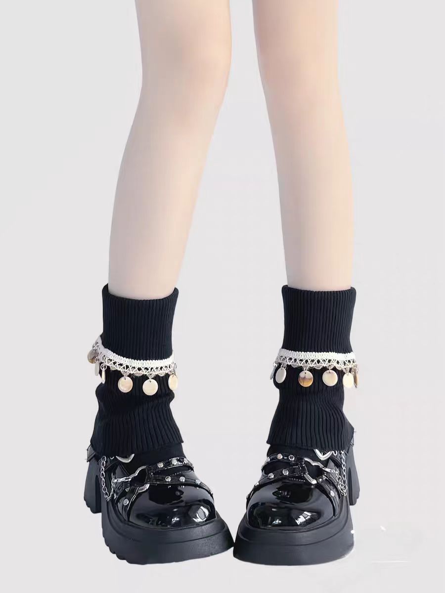 Inspired by Japanese school fashion and winter coziness, these knit leg warmers combine playful charm with warmth. The soft cream color, fluffy pom-pom detail, and fold-over fringe design create a sweet, nostalgic aesthetic. Perfect for pairing with JK uniforms or casual outfits, they offer both style and comfort during the chilly seasons.
