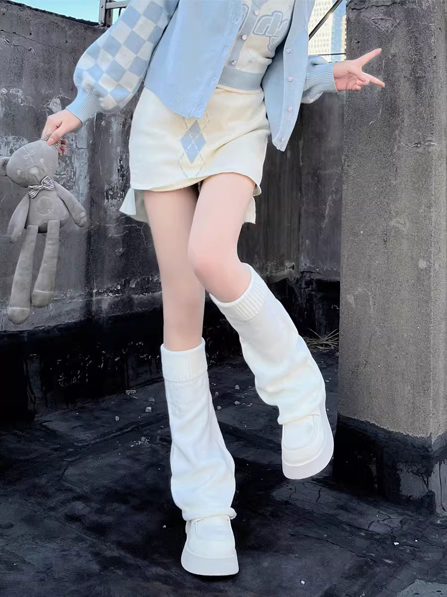 Inspired by the bold fusion of Y2K aesthetics and Japanese street style, these flared leg warmers redefine cozy fashion. The bell-shaped design and soft knit fabric combine retro glamour with Lolita sweetness, while the stacked mid-calf fit offers both warmth and a striking silhouette. Perfect for adding a playful yet edgy statement to any outfit, blending millennial nostalgia with contemporary cuteness.