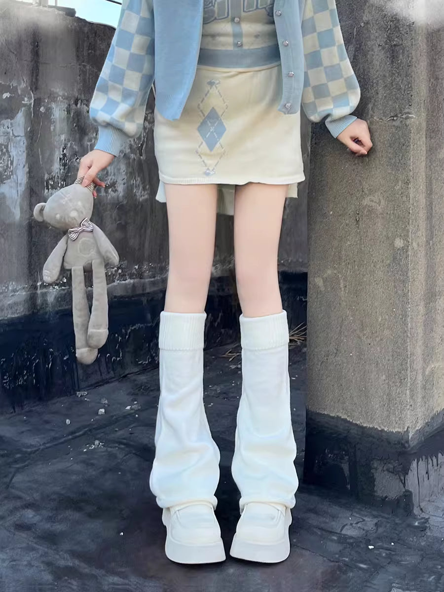 Inspired by the bold fusion of Y2K aesthetics and Japanese street style, these flared leg warmers redefine cozy fashion. The bell-shaped design and soft knit fabric combine retro glamour with Lolita sweetness, while the stacked mid-calf fit offers both warmth and a striking silhouette. Perfect for adding a playful yet edgy statement to any outfit, blending millennial nostalgia with contemporary cuteness.