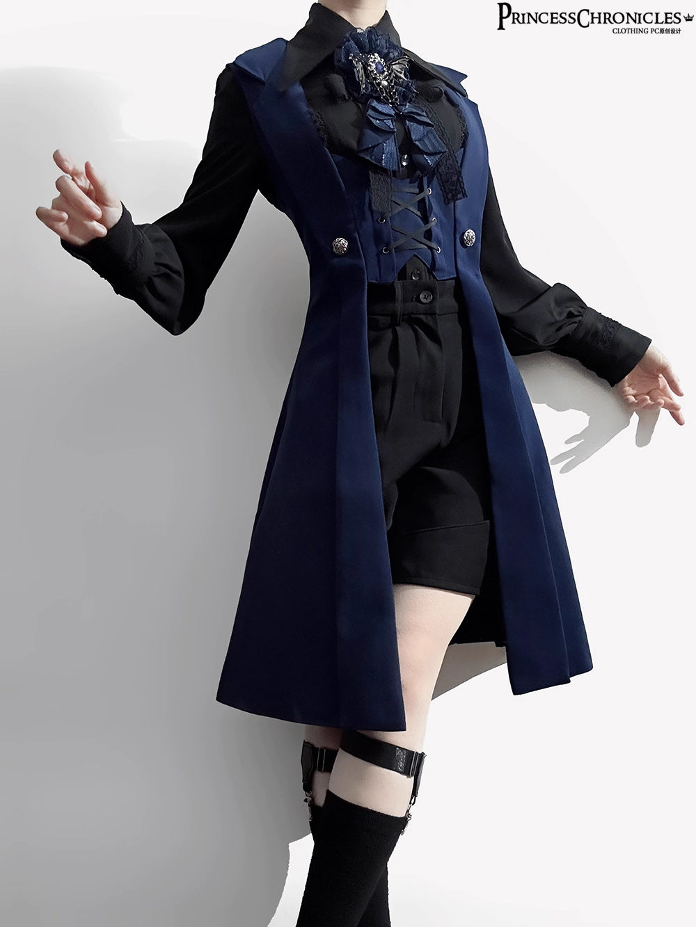 Inspired by midnight sonatas and medieval armor, this long vest merges dark romance with sharp tailoring. The deep blue hue evokes twilight mystery, while structured seams and a slim silhouette create a modern yet timeless profile. Crafted from heavy-duty twill with subtle metallic hardware, it layers over blouses or dresses to transform any outfit into a narrative of shadowy elegance and poetic rebellion.