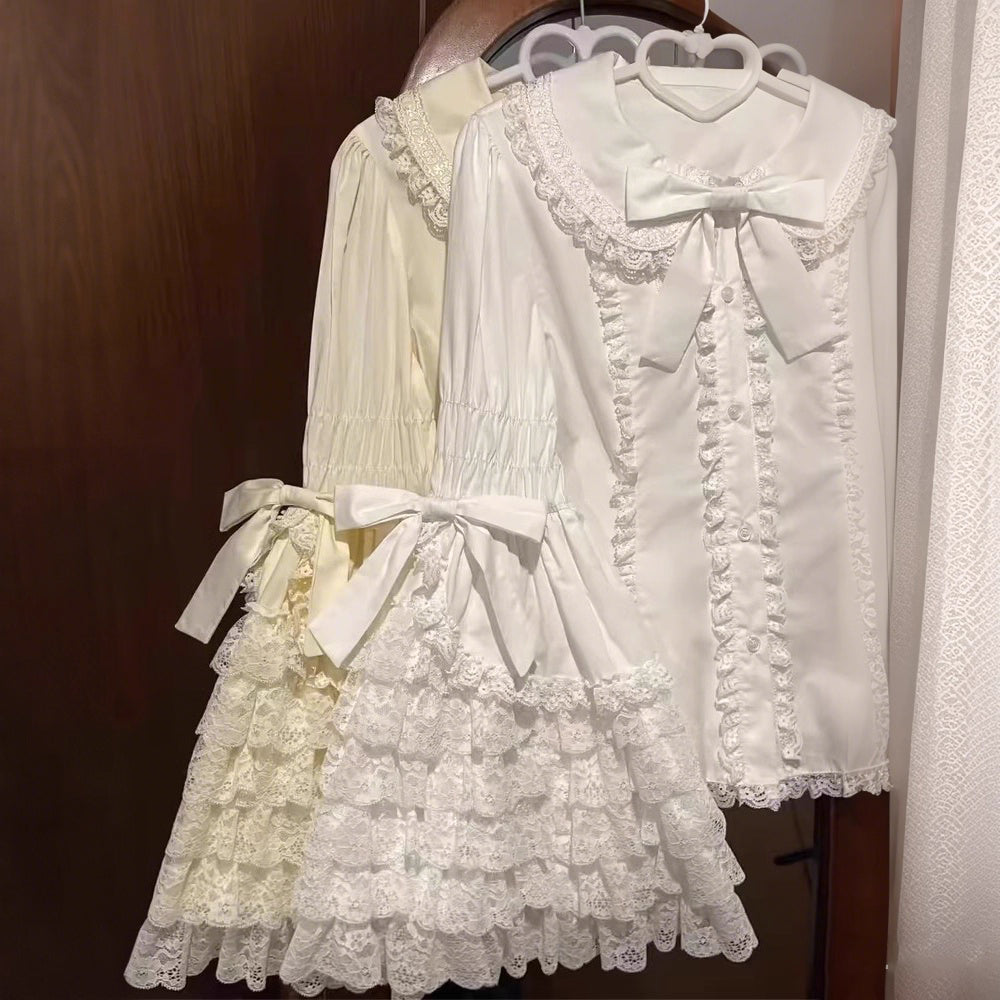 Inspired by antique porcelain dolls and Victorian elegance, this blouse features dramatic gigot sleeves, delicate lace trim, and a tailored yet forgiving fit. The ivory and black color options evoke timeless sophistication, while lightweight fabric ensures comfort. Designed to layer under jumperskirts or wear standalone, it celebrates opulent nostalgia with modern inclusivity. Perfect for creating a poetic, romantic silhouette.